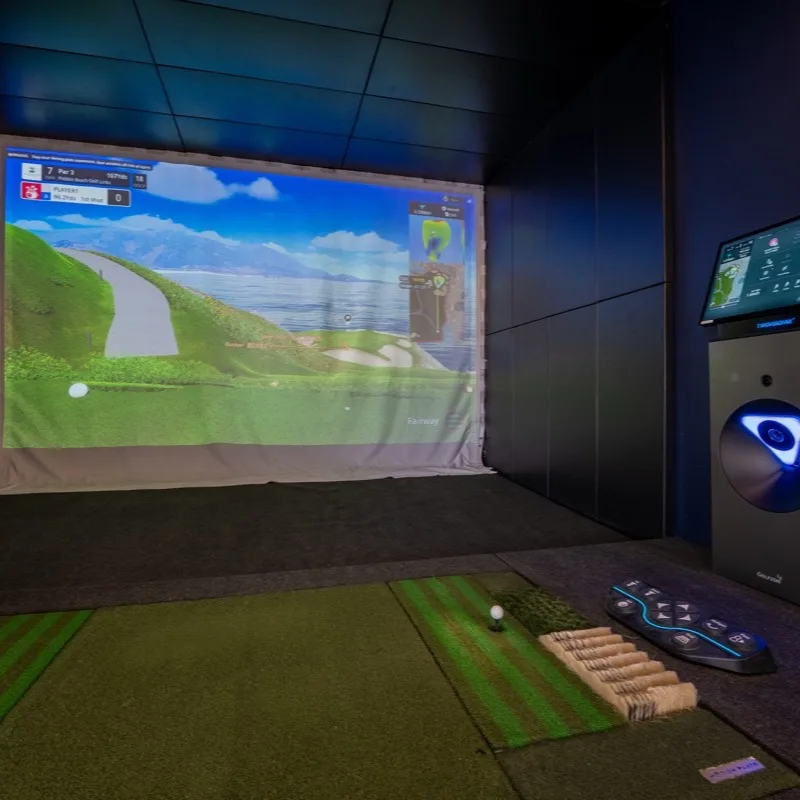 A simulator bay at 2-1-Fore Golf in Richardson, TX